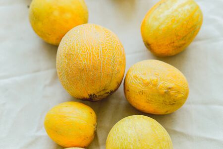 A group of bright orange melon berries. seasonal summer fruitsの写真素材