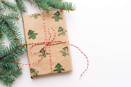 Christmas or new year's background, plain composition of Christmas gifts and fir branches, Flatlay,...
