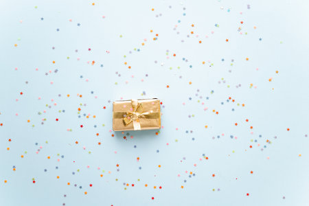Golden Christmas or new year's background, plain composition of golden Christmas gifts. Flatlay, empty space for greeting text.christmas conceptの写真素材