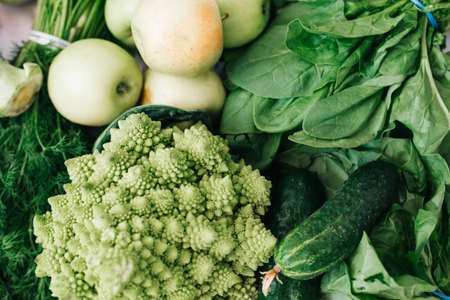 background of fresh green healthy fruits and vegetables.の写真素材
