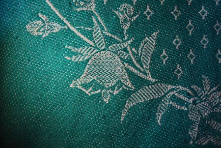 A dense green veil of large threads and different shapes, patterns and color patterns with...