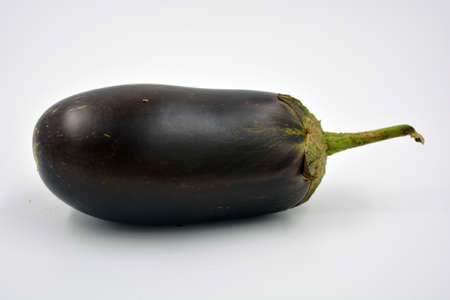 Fresh and healthy vegetables from breast, blue, purple eggplants located on a white background.の写真素材