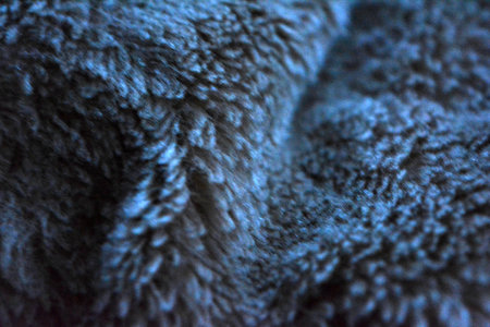 Fur fluffy background, synthetic, not natural gray fluffy fur. close up of blue fur texture for background. High resolution photo.の写真素材