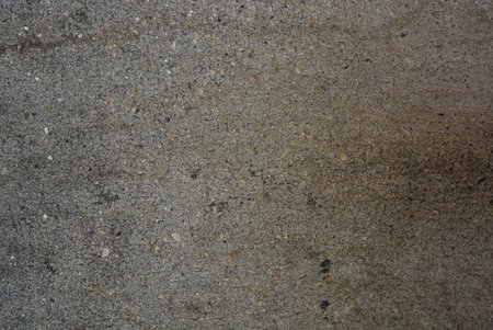 Grunge cement wall texture. Background and texture for design. Grey, cement road, construction road, building foundation inside the house.の写真素材
