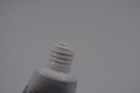 close up of a spray bottle on a white background with copy space. Medicine, medicines, dental and oral care products, toothpastes, stylish toothbrush arranged on white background.の写真素材