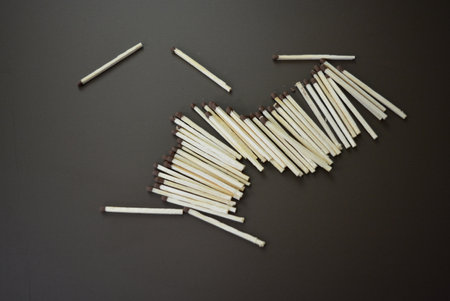 New matches on a brown matte background.の写真素材