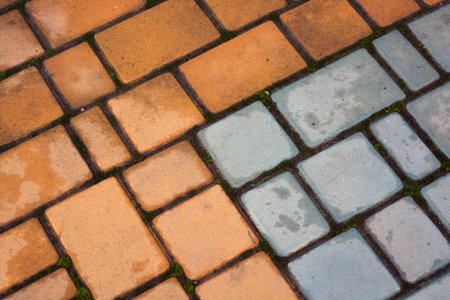 Brick walkway in the park. Abstract background for design. Building materials, road surface,...