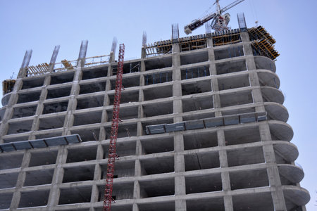Buildings and structures in the process of erection, laying of building materials using construction...