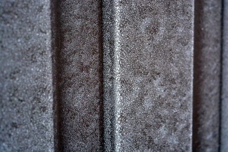 Close up of roofing material. Abstract background and texture for design. Bright white frost on...