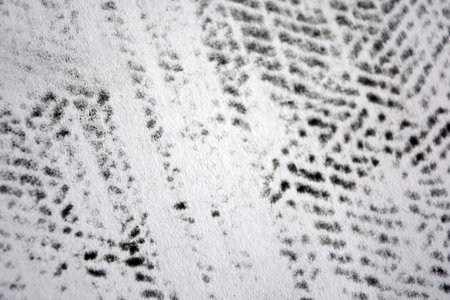 Close up of black and white pattern on a white fabric. White office sheets of A4 paper, on which printed with a laser printer - unusual drawings of graphics, texture, structure.の写真素材
