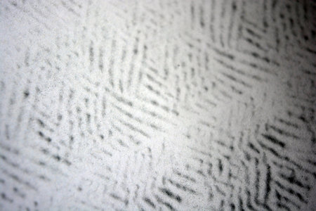 Abstract background: black and white stripes on the surface of the wall. White office sheets of A4 paper, on which printed a laser printer - drawings of graphics, texture.の写真素材
