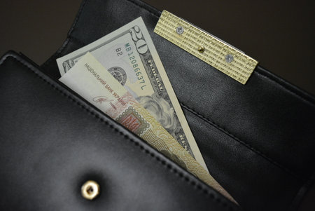 Things and objects that are used every day, one hundred hryvnias, twenty dollars. A beautiful black...