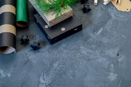 Packing of new kraft paper of the New Year and Christmas gift, green and black. Material for...
