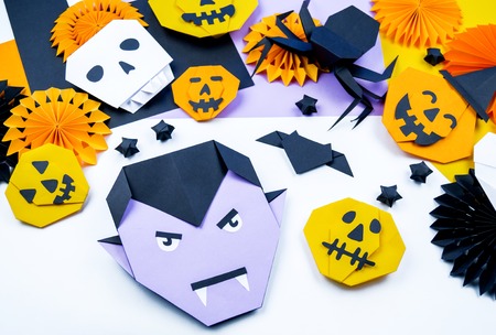 Origami Halloween. Bat, ghost, pumpkin, vampire paper. Copy spase. Creativity children kindergartenの写真素材