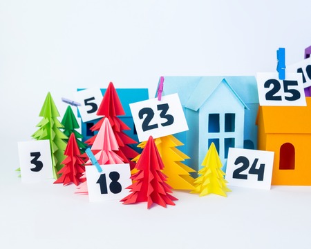 Advent calendar for baby rainbow color. House and Christmas tree paper craft. Christmas holiday...