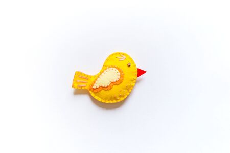Yellow felt bird workshop. Materials for creativity with children. Happy Easter holiday.