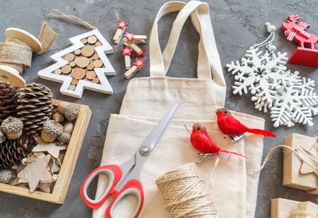 Zero waste Christmas, concept flat layout on gray plaster. Hand crafted gifts with natural Christmas decorations without plastic.の写真素材
