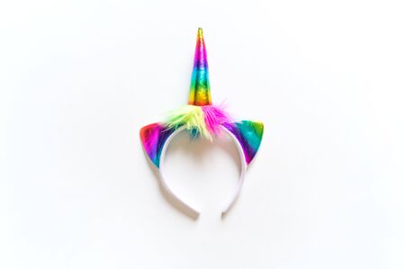 Headband rainbow unicorn headband on a white background. Birthday party celebrationの写真素材