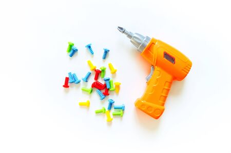 Children's toy plastic screwdriver. The boy is a tool for repair. White backgroundの写真素材
