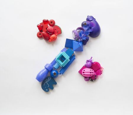 Children's toys rainbow. Letters and symbols from toys. White background.の写真素材