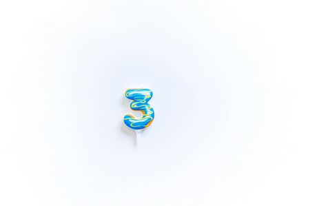 Candle number. Donut holiday White background Birthday.