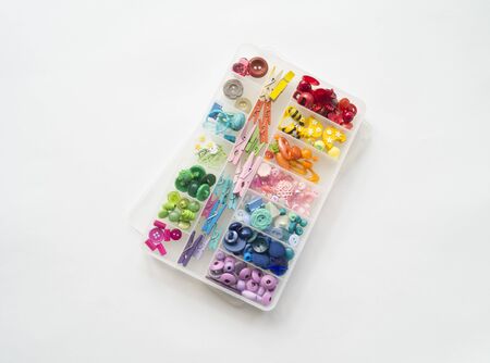 Beads in a box. Sort material. Favorite hobby weaving bracelets.