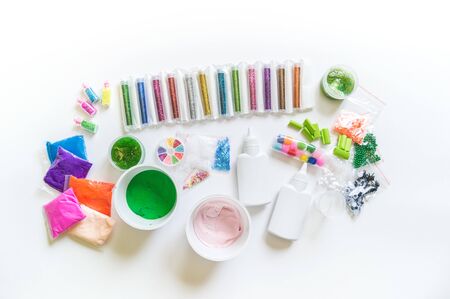 DIY slime. Ingredients and decorations for slimes. Jars of sequins and beads