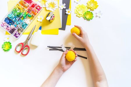 Little bee crafts. Children's hands are creative work. Diy soft toy. Material for creativity.の写真素材
