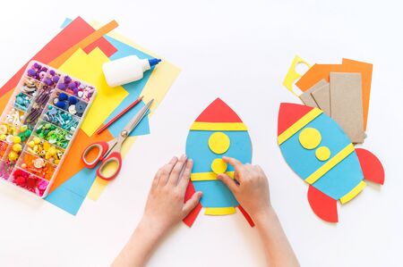 Rocket craft made of cardboard and paper. Recycling children's creativity. Do-it-yourself pencil holder.の写真素材