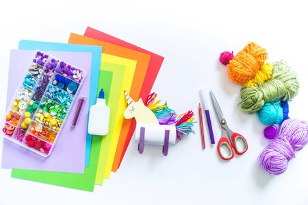 Unicorn cardboard and paper craft. Children's hands do. How to entertain a child. Kindergarten and schoolの写真素材