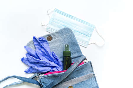 Mask gloves antiseptic in a bag. White background. Coronavirus remediesの写真素材