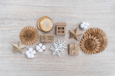 Zero waste Christmas, concept flat layout on rustic wood. Hand crafted gifts with natural Christmas decorations without plastic. Flat lay, top viewの写真素材