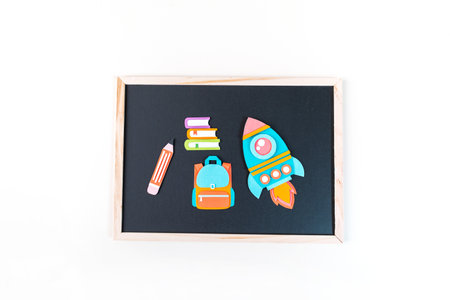Rocket paper craft. Back to school education. Business startup concept. Paper creativity Black...