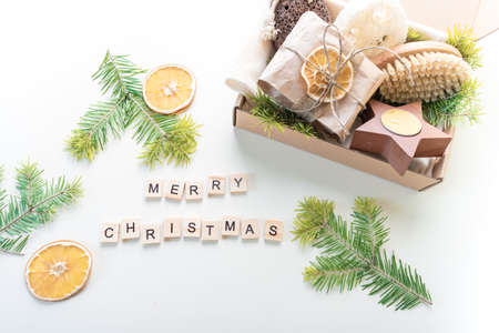 Christmas gift set. Eco friendly material. Zero waste. Wooden letters. Copy spaceの写真素材