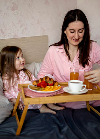 happy loving. mother and daughter are playing at home. mother's day. Happy family time at home. Candid childhood lifestyle.の写真素材