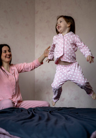 happy loving. mother and daughter are playing at home. mother's day. Happy family time at home. Candid childhood lifestyle.の写真素材