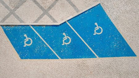 Handicap symbol on parking space. Disability car parking sign. Handicapped parking area. High quality photoの写真素材