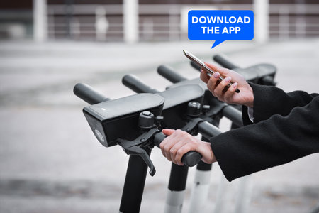 Woman renting an electric scooter with a mobile phone application. App for e-scooter rentの写真素材