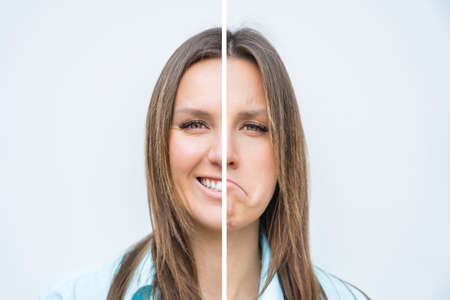 Happy sad woman face. Portrait of young beautiful lady with smiling and frowning face. Expressing...