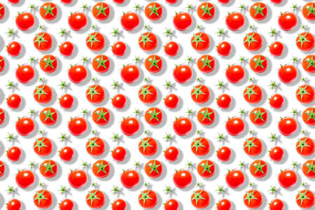 Top view of ripe red cherry tomatoes on whiteの写真素材