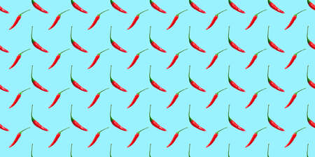 Red hot chili peppers seamless pattern on blueの写真素材