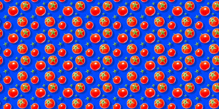 Seamless vegetable pattern of fresh ripe red cherry tomatoes isolated on blue background. Top view. Banner. Flat lay composition.の写真素材