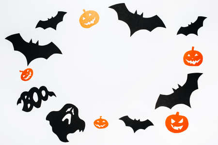 Happy halloween holiday concept. Bats, pumpkins and ghosts on white isolated backgroundの写真素材