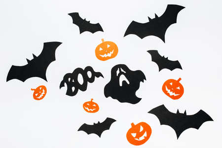 Happy halloween holiday concept. Bats, pumpkins and ghosts on white isolated backgroundの写真素材