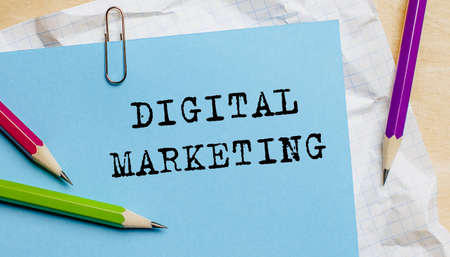 Digital Marketing text written on a paper with pencils in officeの写真素材