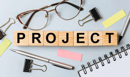 PROJECT word on wooden cubes on office deskの写真素材