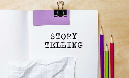 STORY TELLING text written on a paper with pencils on the desk in the officeの写真素材