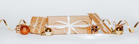 New year golden gifts for merry christmas isolated on white backgroundの写真素材