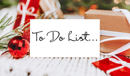 Merry christmas and merry new year concept with gift boxes and greeting card with text To Do List...の写真素材