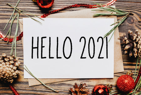 Merry christmas and merry new year concept notebook with text Hello 2021の写真素材